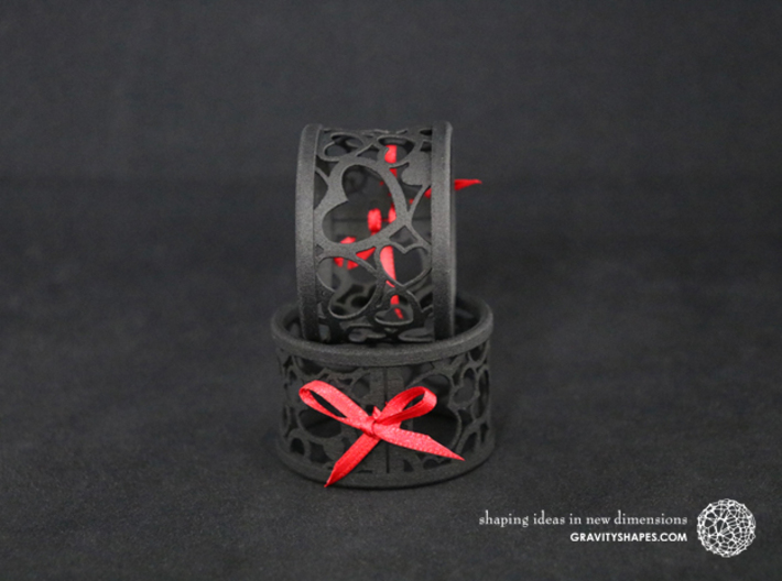 Set of 2 large napkin rings with Hearts 3d printed The photo shows prints made of black strong and flexible incl. red lacing.
