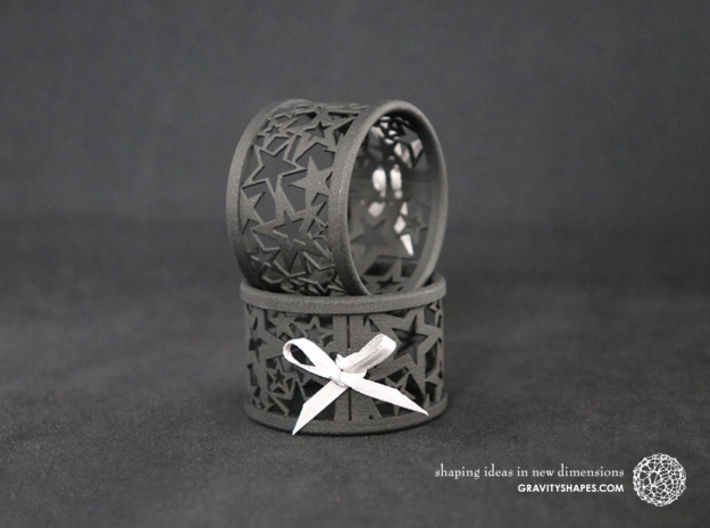 Set of 2 large Christmas napkin rings with Stars 3d printed The photo shows prints made of black strong and flexible incl. silver lacing.