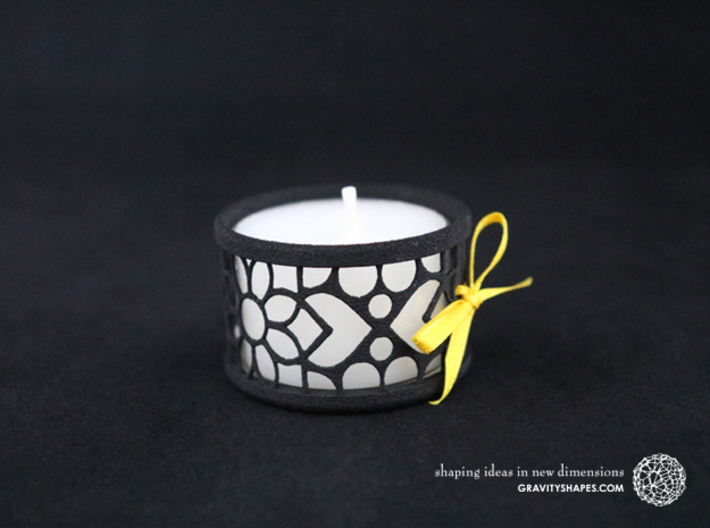 Small tealight holder with Mosaic-2 3d printed The photo shows a print made of black strong and flexible incl. yellow lacing and a high 8h tealight candle.