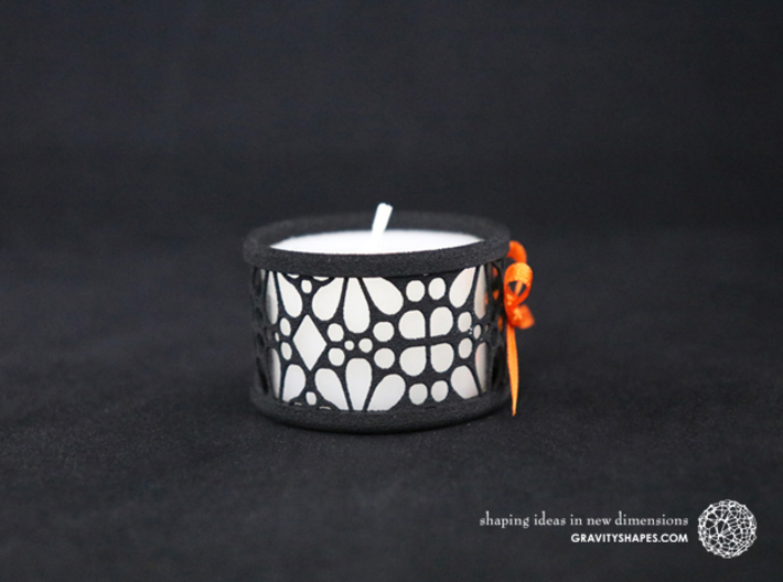 Small tealight holder with Mosaic-3 3d printed The photo shows a print made of black strong and flexible incl. orange lacing and a high 8h tealight candle.