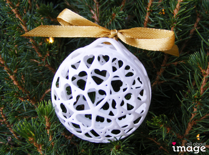 Customizable Christmas Ornament - Flowers 3d printed The crossed loop on the top allows you to tie it onto a branch in any direction (different model shown for illustration) 