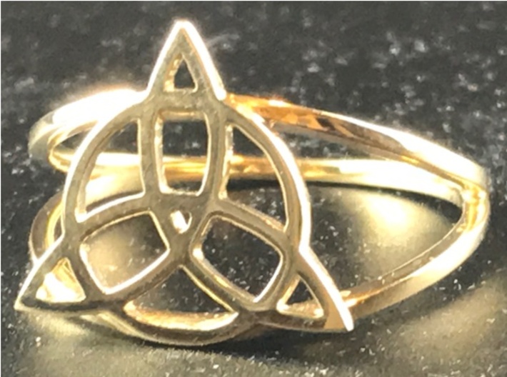 Triquetra ring 3d printed Triquetra ring in polished brass.