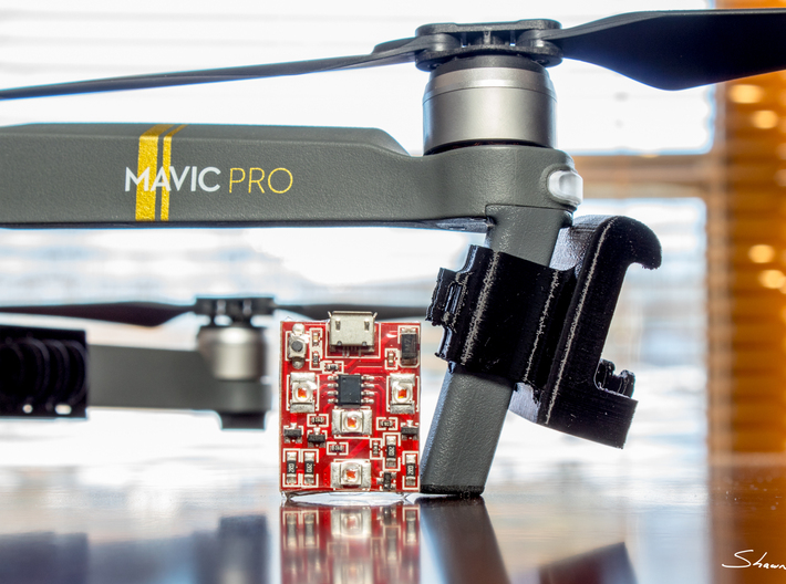 ARC II Strobe Light Enclosure for DJI Mavic Pro Dr 3d printed Shown attached to the Mavic Pro drone and next to one of the Firehouse Technology ARC II circuit boards