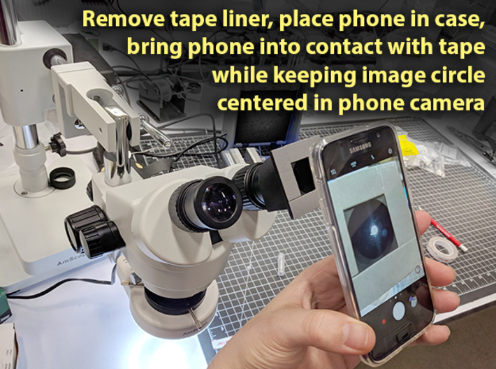 AmScope Microscope Cellphone Adapter 3d printed Carefully attach phone with cheap case.