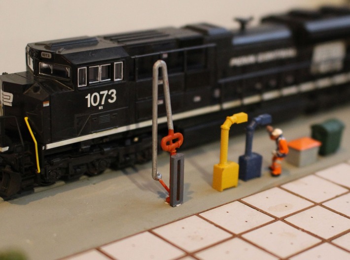 N Scale 4x Fuel Crane #1 Long 3d printed Fuel crane next to the boom cabinets