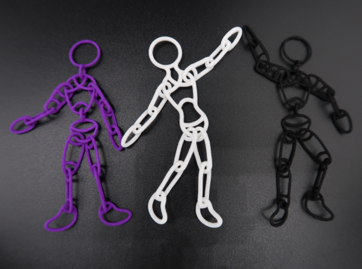 Ragdoll Pendant (11 parts) 3d printed Purple and Black Premium Strong & Flexible Polished, surrounding their 5-part sibling.