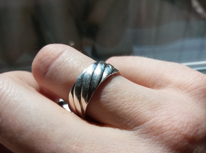 Twisted Band Ring 3d printed I've been wearing ths about a year, so it's a little scuffed up.