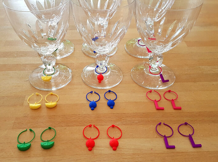 Ladybug Glass Tag 3d printed various wine charms displayed