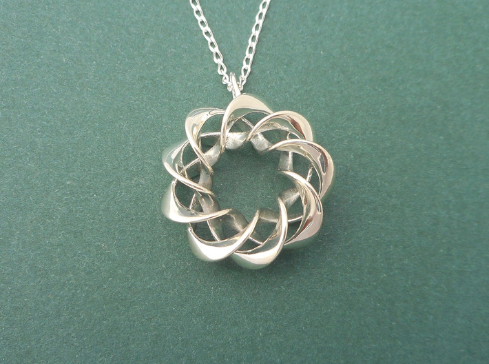 Torus Ribbons - Pendant in Cast Metals 3d printed Front view, where you don't see connections between the ribbons
