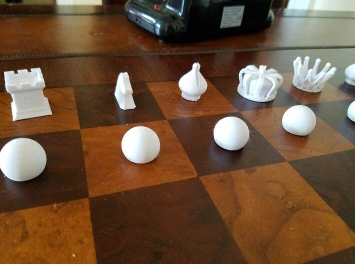 MILOSAURUS Chess Symbols Chess Set 3d printed 