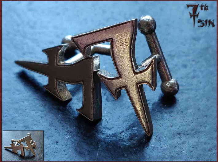 Monogrammed cufflink set 3d printed Photograph of the final product. Mind you, this is a detailed closeup. The actual object stands 23 mm tall. The insert in the lower left corner is a more representative of the actual size of the finished product.