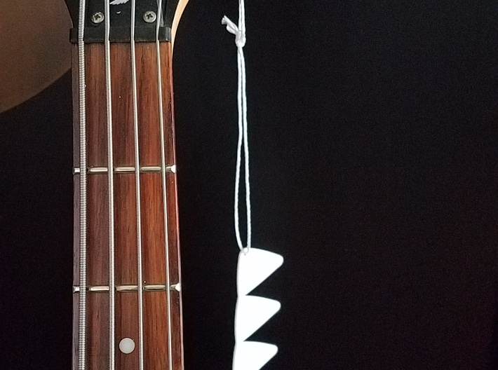 Shaped Guitar Pick 3d printed Tie it off to your guitar.