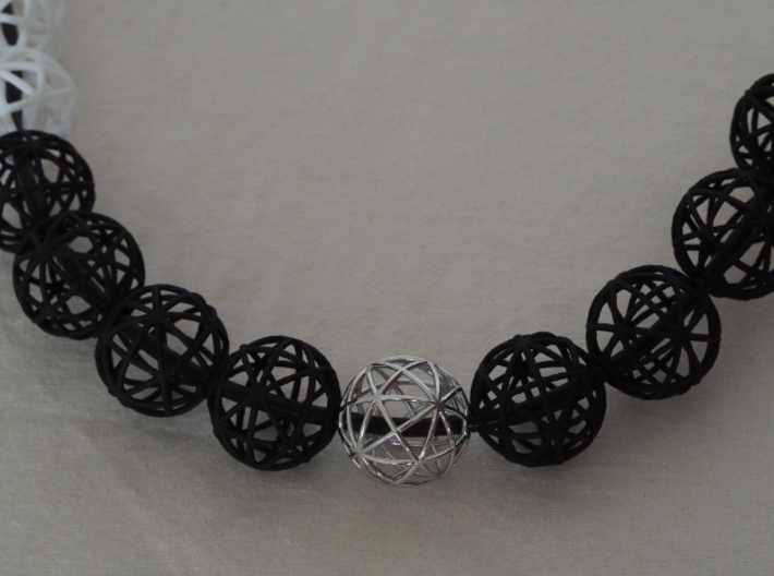 torus_pearl_type6_thick 3d printed Black PA12, White Processed Versatile Plastic and Rhodium Plated Brass