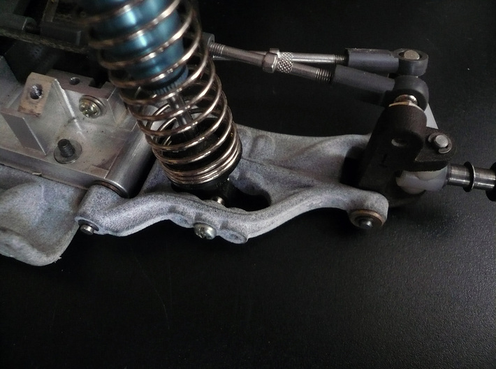 B2 Dyna Storm front suspension arm 3d printed brass bushing Version