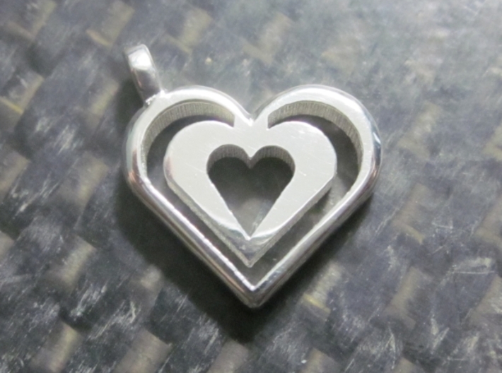 Enjoined Hearts Pendant 3d printed Enjoined Heart Pendant in Polished Silver