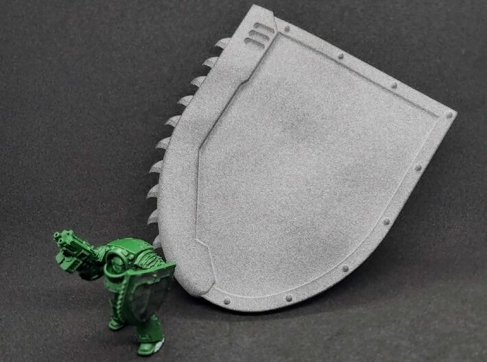 Action Figure Chainshield - Left Handed 3d printed Printed in Grey PA12, compared to a 28mm heroic scale model holding a Left-handed Chainshield (Winged Sword design)