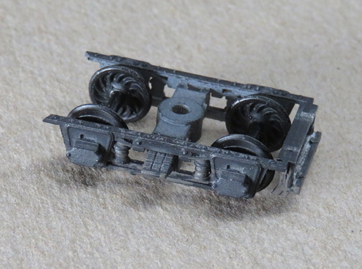 EBT Coach 9 truck solid bearing for Kadee wheelset 3d printed Shown with brake beam on one end. 
