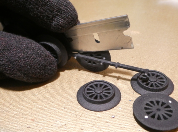 Brick RC Train Wheel Set, Spoked 3d printed The wheels must be gently cut free with a modeling blade.  Use care-- this step should not be attempted by kids.