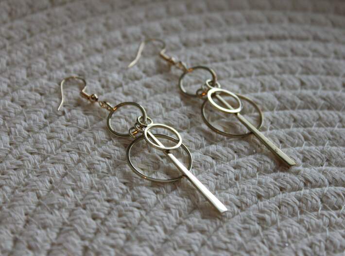 Etta Earrings 3d printed Product shown in Polished Brass.