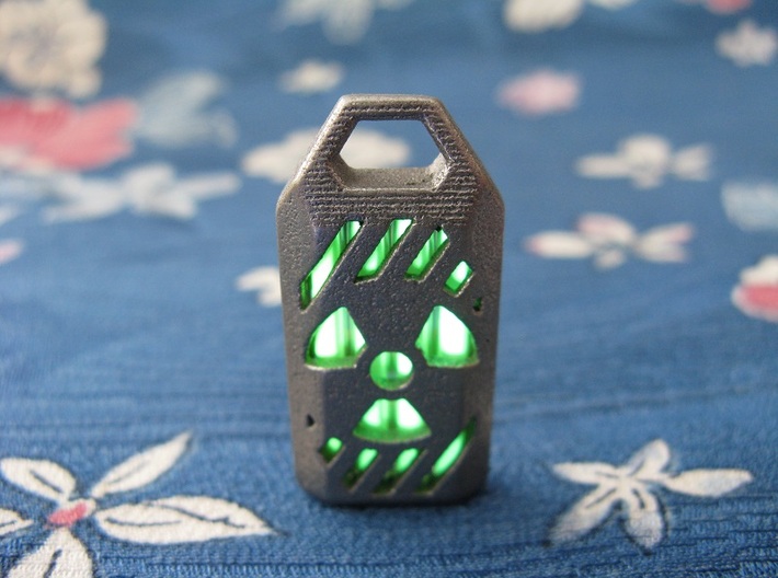 Radiation Lantern 1: Tritium (All Materials) 3d printed In this picture the phosphorus coating on the tritium vial is being energised by UV light.