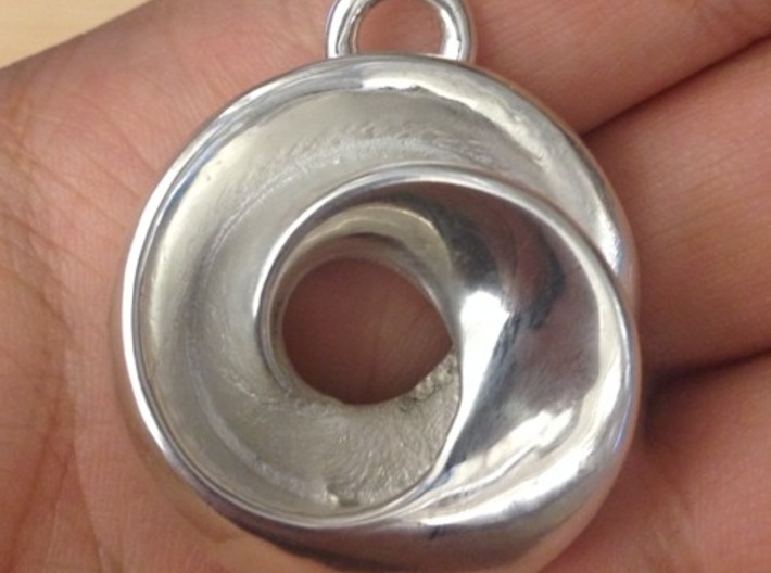 Figure 8 Klein Keychain 3d printed Actual printing with polished silver