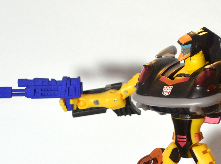 Autobot Jackpot's Heat Induced Photon Rifle 3d printed Print shown with Jackpot action figure.