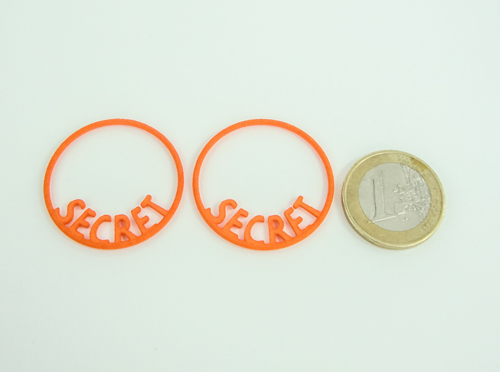 Custom Hoop Earrings - Secret 30mm 3d printed Custom text Hoop Earrings printed in Orange Strong & Flexible Polished with 1€ coin for scale. Size is 30mm.