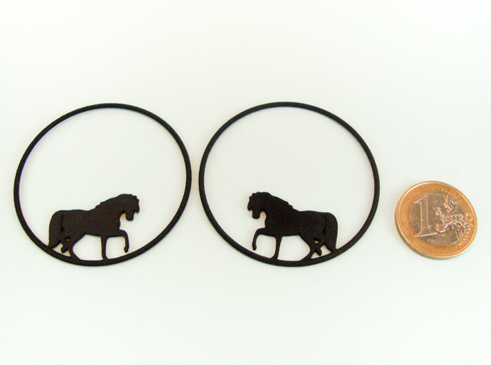 Horse Hoop Earrings 50mm 3d printed Horse Hoop Earrings 50mm printed in Black Strong & Flexible with 1€ coin for scale.