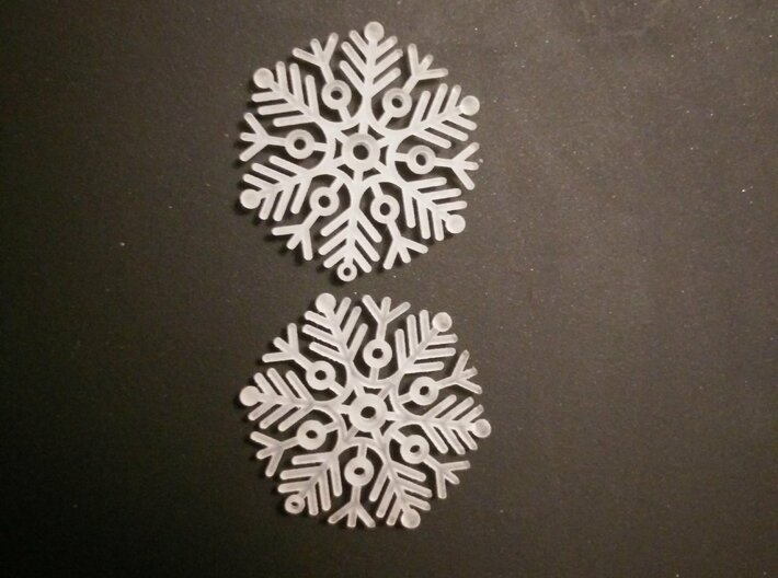 Snowflake Earring 3d printed Same material with different design.