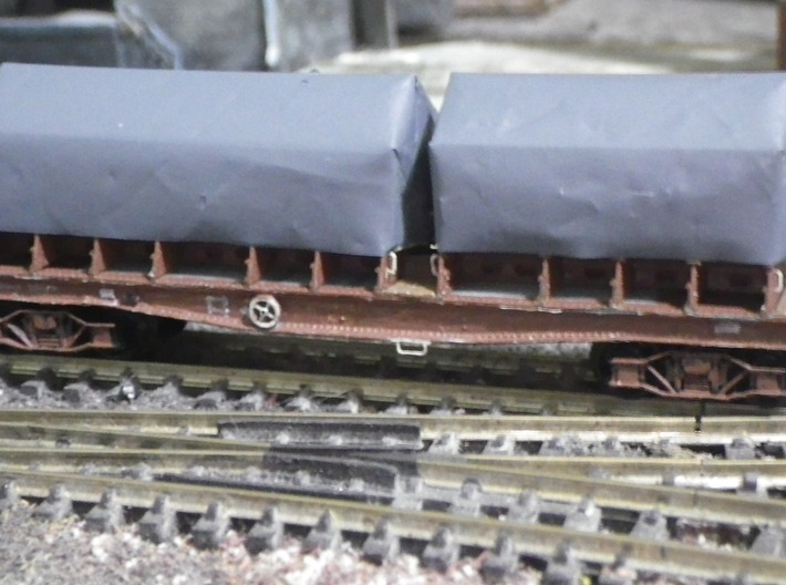 Coil E & G (ex Warflat) cradles with rivetted ends 3d printed Painted, fitted, and tarpaulins fitted (grey plastic bag). 