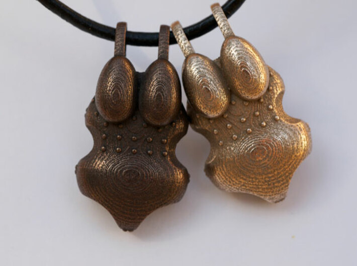 I Walk With #KubraKhademi Pendant 3d printed Stainless Steel (Right) Polished Bronze Steel (Left)