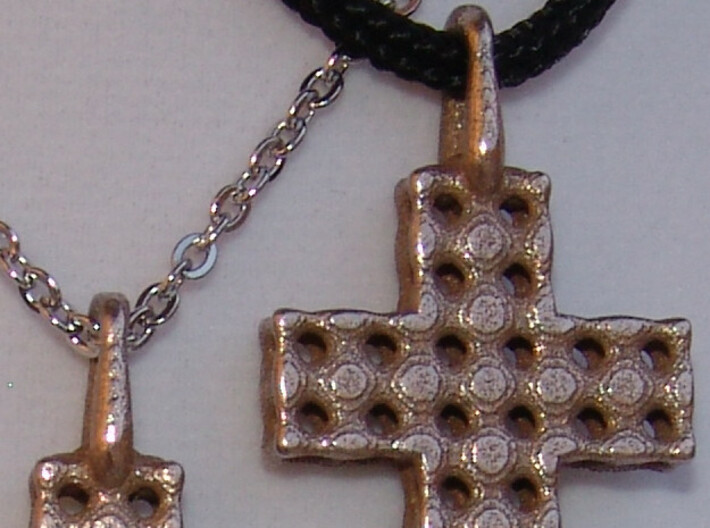 Cross with Depth 3d printed Stainless Steel Cross Pendants - Two Pictured. Closeup. Actual Photo.