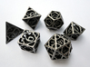 Cage Dice Set 3d printed In stainless steel and inked.