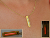 A Tritium Pendant 3d printed Pendant made of Polished Gold Steel w/ red vial