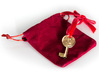 Grand Central Key 3d printed Printed in polished brass, with red velvet ribbon and bag