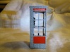 Telephone Booth, 1/32 Scale 3d printed Metallic plastic appears speckled and glittery when viewed close up.
