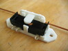 Railroad switch/point actuator PECO PL-13 (x9) 3d printed This shows how the bracket holds the PECO PL-13 switch.