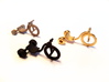 Drift Trike Pendant 3d printed Left to right: Stainless Steel, Matte Black Steel, Polished Gold Steel