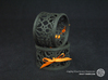 A large napkin ring with Mosaic-3a 3d printed The photo shows an own print (FDM print) made of black wood incl. decorative lacing.