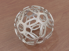 Symmetrical Pattern Sphere 3d printed Polished Steel (render)