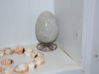 Scimitar Egg Stand 3d printed The nickel medium stand in situ on my trinket shelf