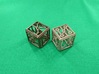 Singing Vertex Dice 3d printed Singing Vertex Dice in polished bronze steel (left) and polished bronze silver steel (right).