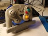 Video Game Controller Stand 3d printed PowerA GameCube Controller in stand