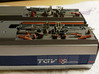 Distanzstück Stromabnehmer TGV Sud Est (vorne) 3d printed mounted on orange TGV