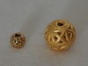 torus_pearl_loop_type6_normal 3d printed Polished Brass is Small and Polished Gold Steel is Medium.