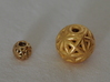 torus_pearl_type4_ultrathin 3d printed Polished Brass is Small and Polished Gold Steel is Medium.