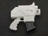 Action Figure Bolt Pistol 3d printed Printed in White Processed Versatile Plastic, shown with the magazine from a 1:12th scale action figure's bolt weapon