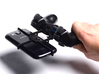 Controller mount for PS3 & HTC Desire 610 3d printed Holding in hand - Black PS3 controller with a s3 and Black UtorCase
