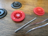Brick RC Train Wheel Set, Spoked 3d printed While being manufactured, plastic dust sometimes builds up in the center axle hole.  If the axles seem difficult to install, simply scrape away the dust with a paper clip or some tweezers.