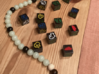 Aliens dice Set13 3d printed Painted using Resin and sanded flush with couter-bead chain   (Not included)